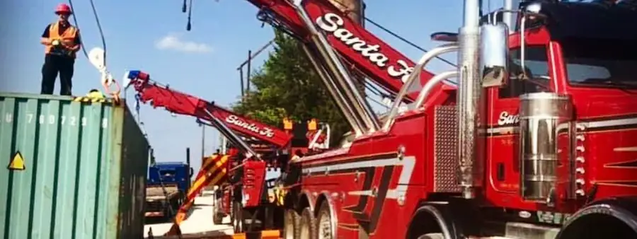 Two Santa Fe rotators working with Bardroff Heavy Hauling on container lift